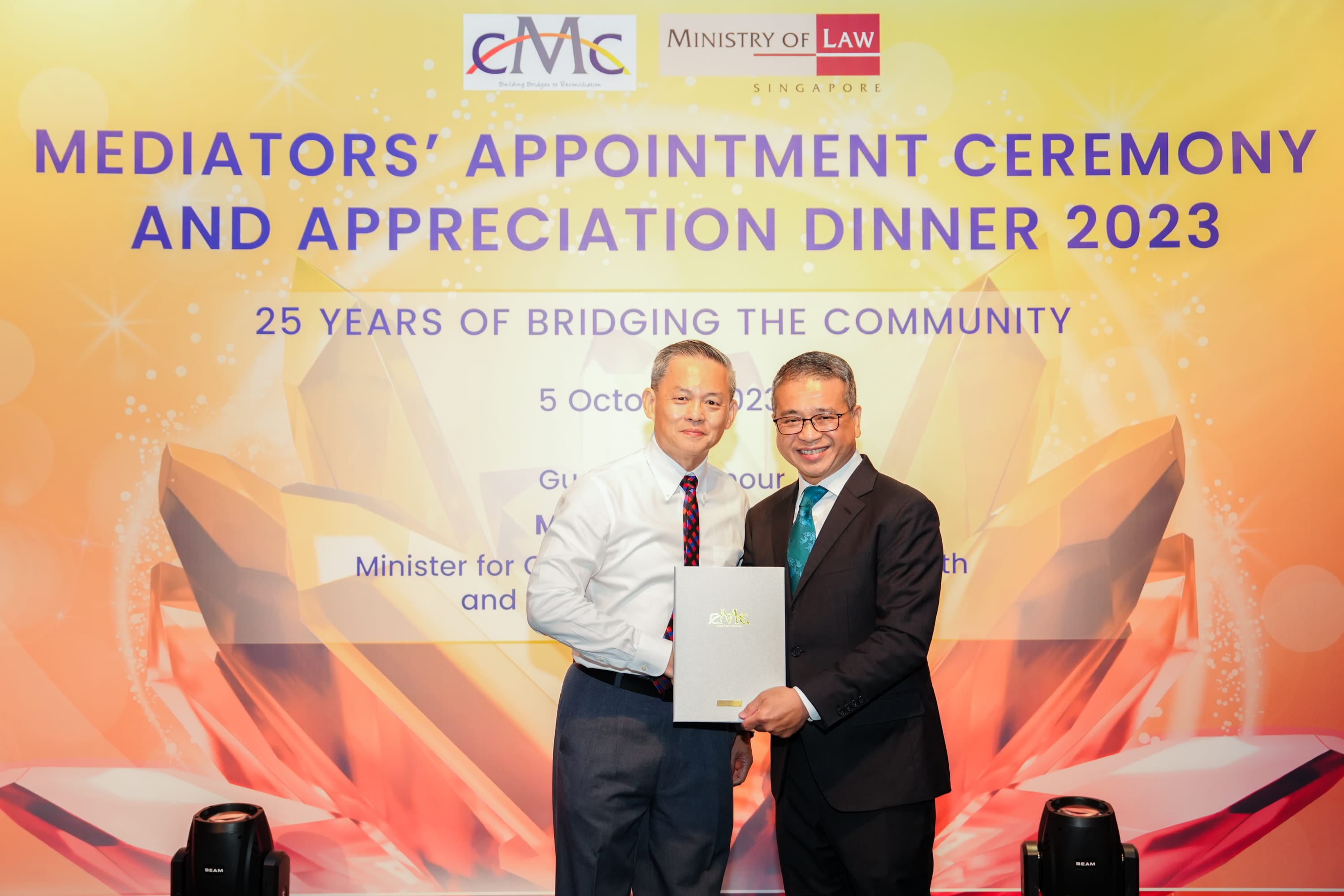 reappointment Image 1 award with Min Edwin